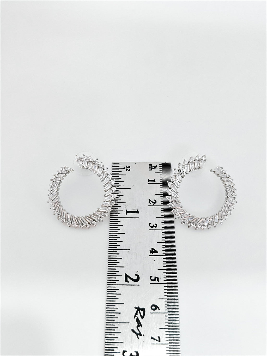 Radiant Spiral Hoop Earrings by SilvSaga