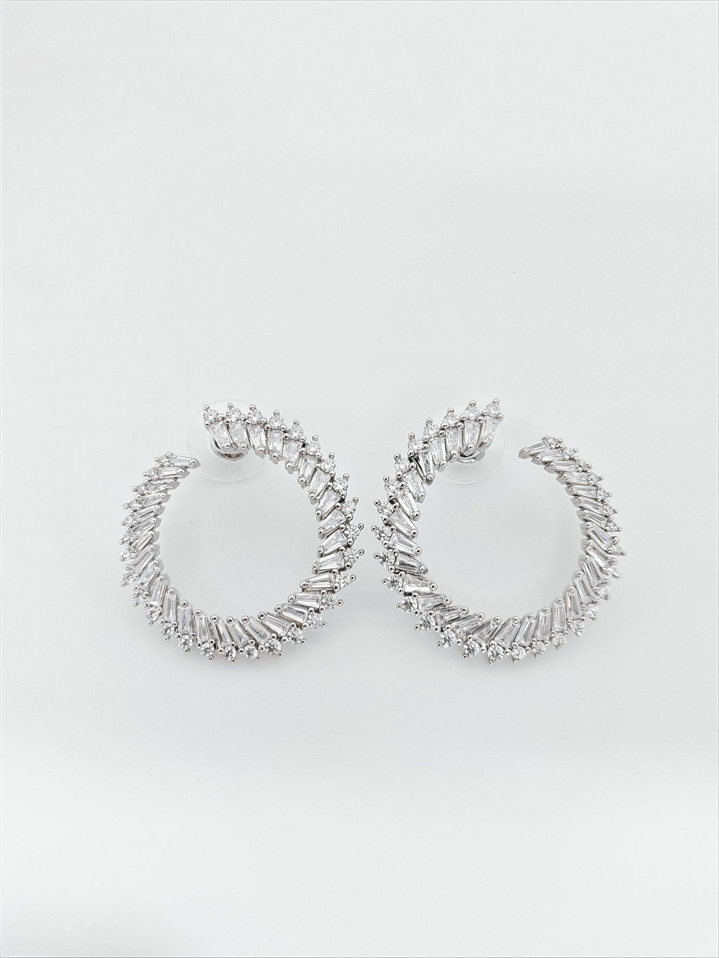 Radiant Spiral Hoop Earrings by SilvSaga
