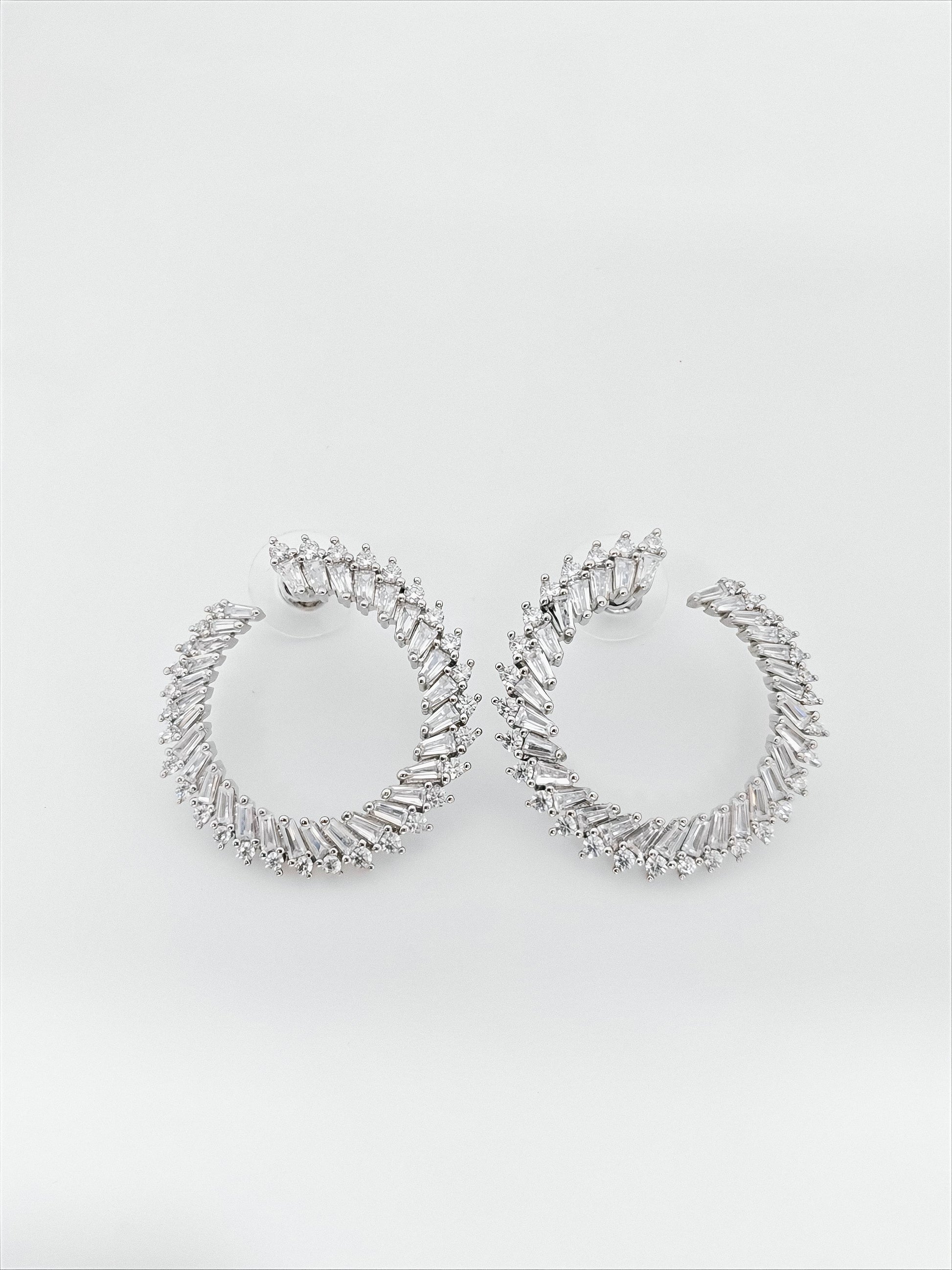 Radiant Spiral Hoop Earrings by SilvSaga