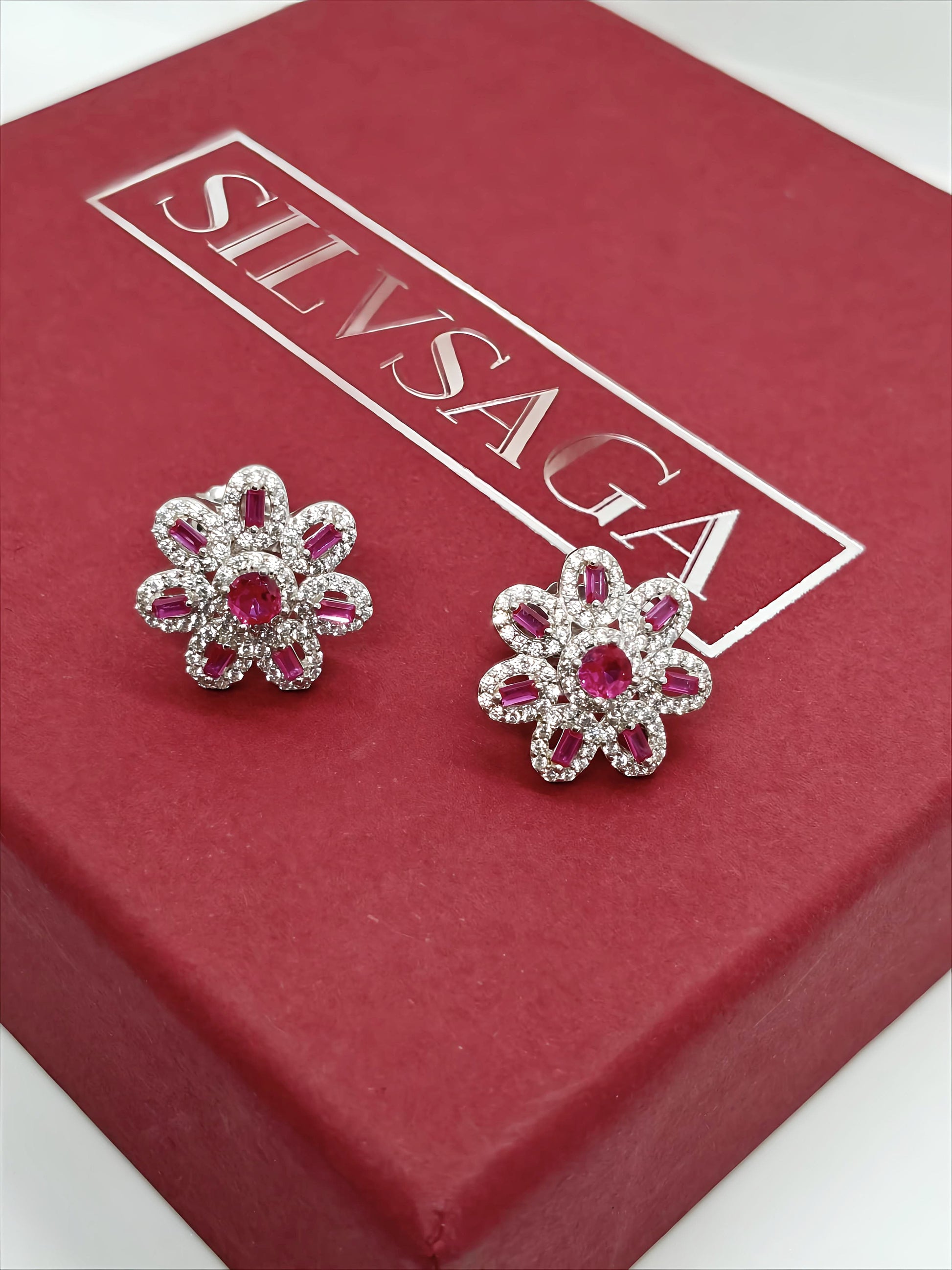 Elegant Sterling Silver Floral Earrings by SilvSaga