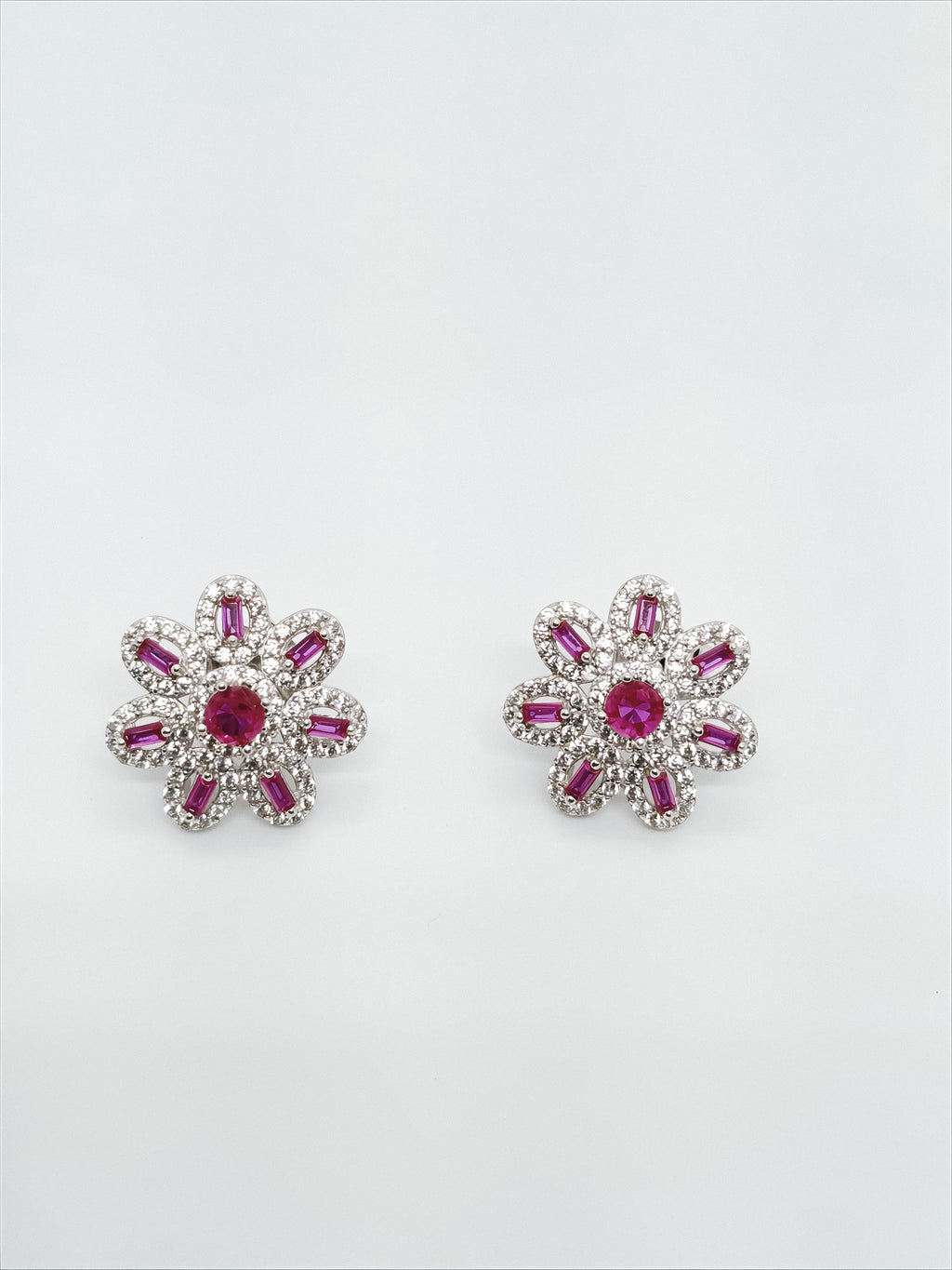 Elegant Sterling Silver Floral Earrings by SilvSaga