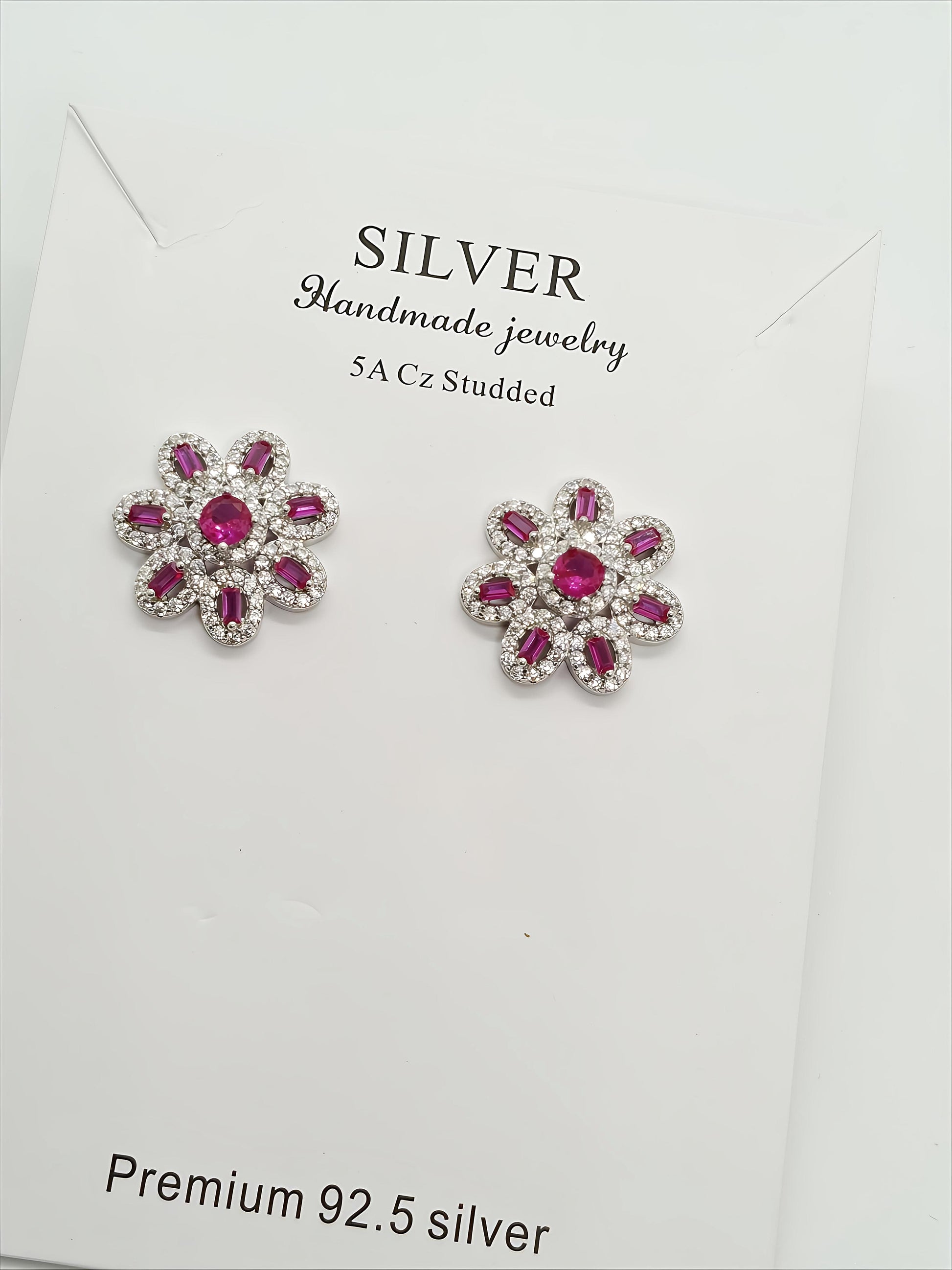 Elegant Sterling Silver Floral Earrings by SilvSaga