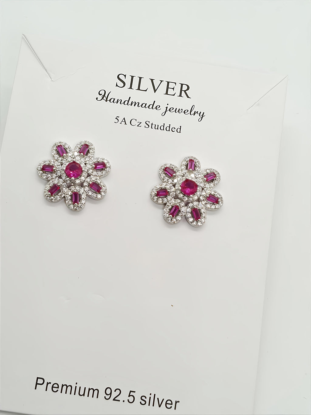 Elegant Sterling Silver Floral Earrings by SilvSaga