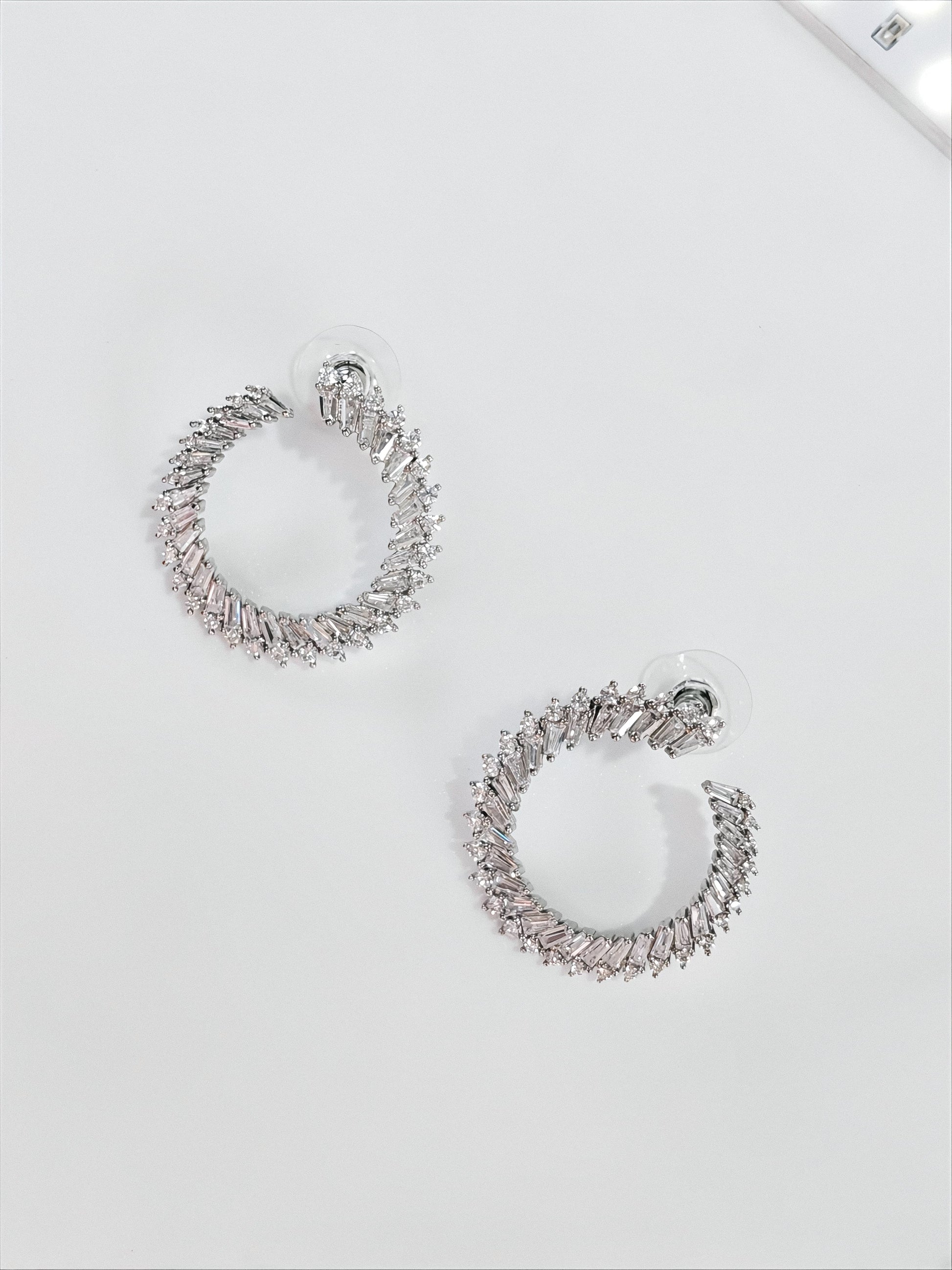 Radiant Spiral Hoop Earrings by SilvSaga
